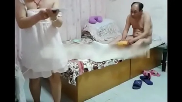 Show Chinese woman and her guy at the hotel warm Tube