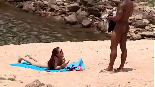 Show Black dude looks for horny babes at the nude beach and bangs one of 'em warm Tube