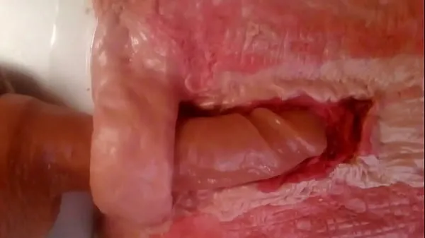 Show Stop-motion film showing how your arse takes a huge dildo and what is really going on inside you as it thrusts and pushes deep into you with extreme close up cross section ending in gushes of rich creamy cum warm Tube