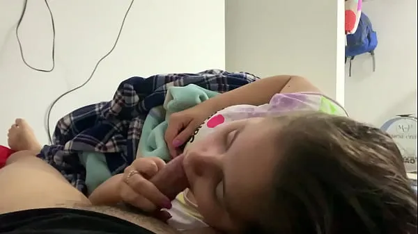 Show My little stepdaughter plays with my cock in her mouth while we watch a movie (She doesn't know I recorded it warm Tube